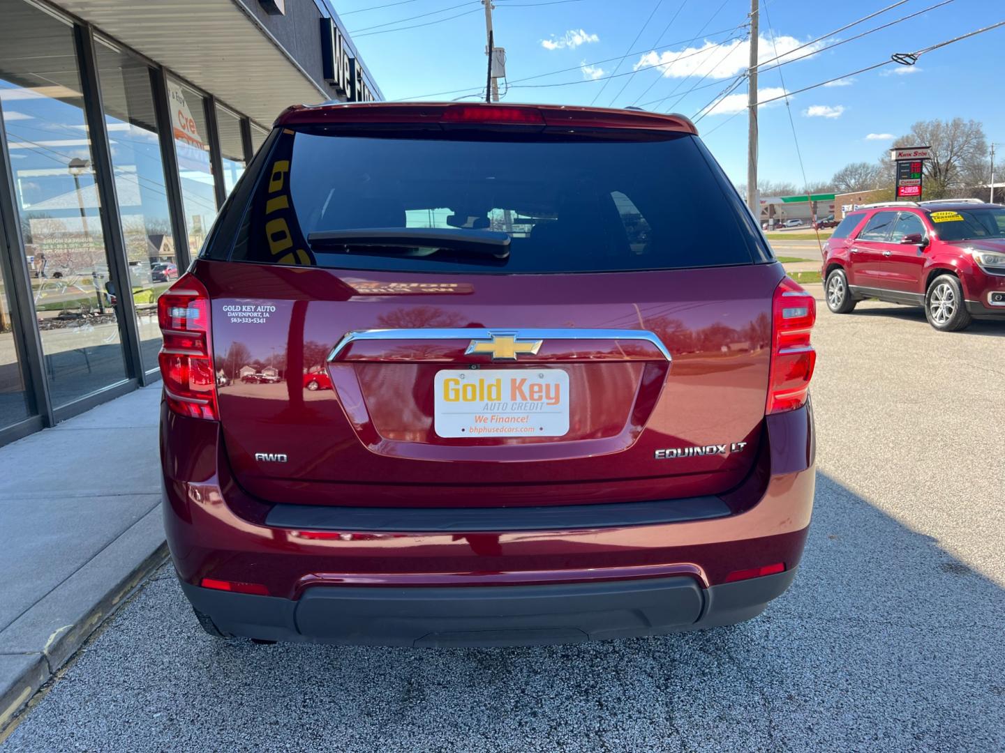 2016 Siren Red Tintcoat Chevrolet Equinox LT AWD (2GNFLFEK9G6) with an 2.4L L4 DOHC 16V FFV engine, 6-Speed Automatic transmission, located at 1633 W Kimberly, Davenport, IA, 52806, (563) 323-5341, 41.559456, -90.598732 - Photo#4